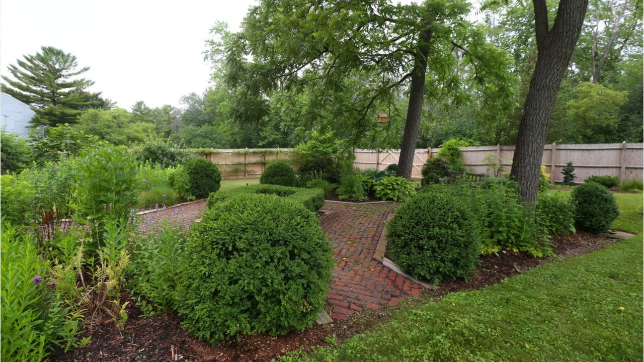 River Hills garden has edible landscaping, pond, pollinator plants