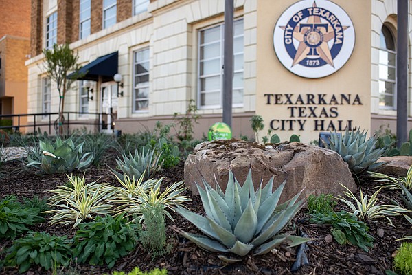 Volunteers step up to give City Hall a landscaping redo