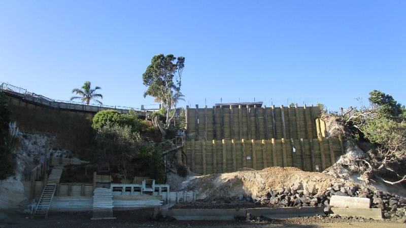 Two large retaining walls built without consent around a property in the Auckland suburb of Beachlands.