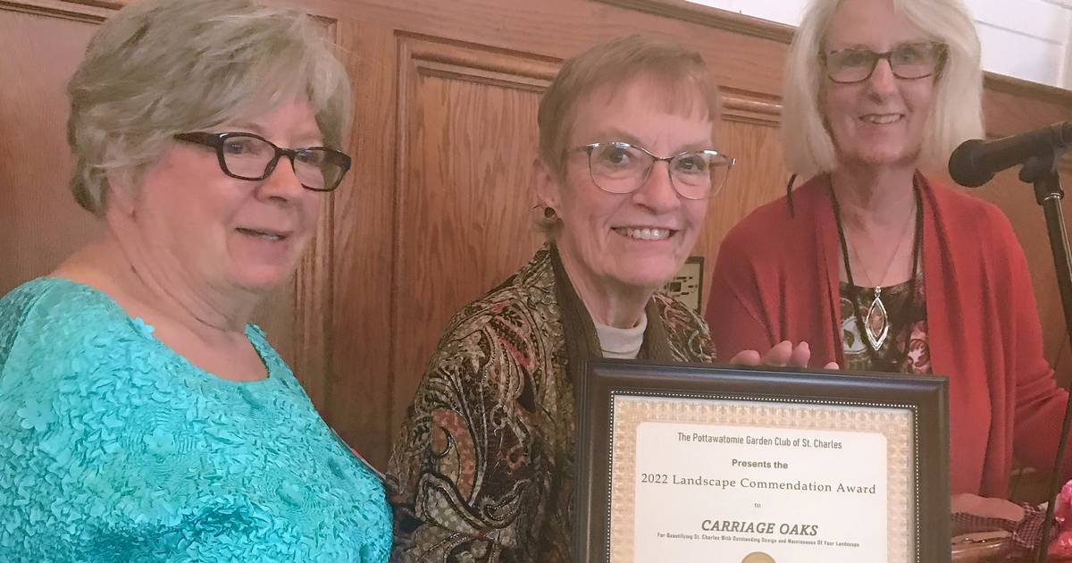 Pottawatomie Garden Club gives landscaping award to Carriage Oaks